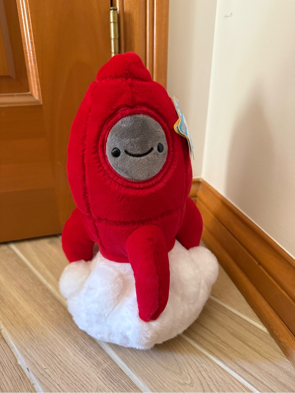 FAO Schwarz Red Rocket Plush with Gray Face on White Cloud
